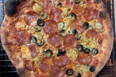 Frozen dough + fennel/chilli salami, olives, picked chillis