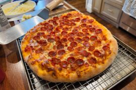 Pepperoni, chicken alfredo garlic, and NY style cheese cooked on a 1/2 inch thick pizza steel