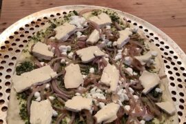 Made as a simple bread  to accompany soup.  Pesto, red onion and Brie.