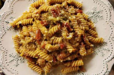 Fusilli with broccoli florets, cherry tomatoes, salsiccia, garlic, white wine, chilli flakes and salted anchovies