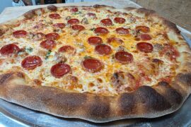 BBQ chicken Pizza and a sausage, basil and pepperoni.