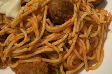 Spaghetti & meatballs (goat meat) (ignore the cheese slice blob)