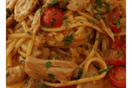 Spaghetti with cherry tomatoes and tuna.