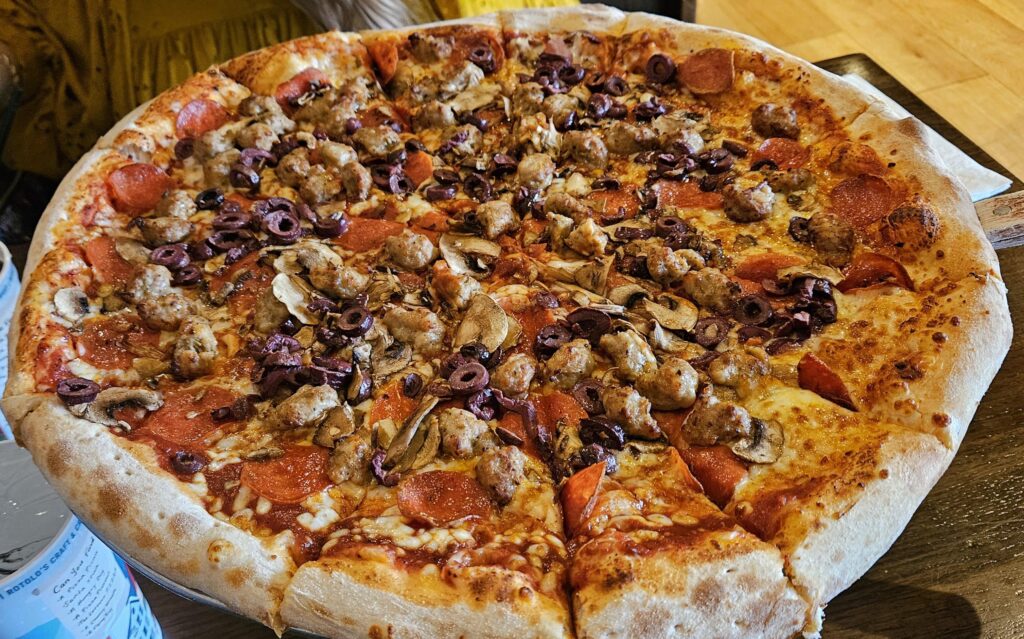 18" pie from local joint, generous sausage!