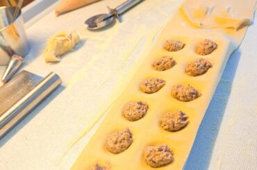 Homemade Ravioli with a filling of salsiccia (also homemade) and ricotta. Served with sage butter and 60 months old parmesan