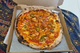 Peri peri chicken, red onions, jalapeño and mozzarella pizza