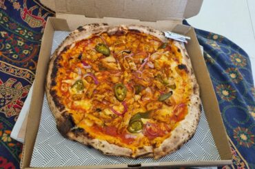 Peri peri chicken, red onions, jalapeño and mozzarella pizza