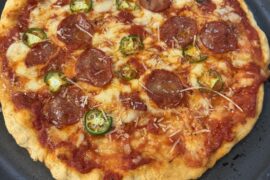 Polly O Cheese on Pizza.