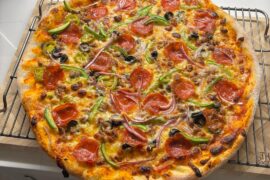 Last nights pie. NY style. Supreme inspired but forgot to get mushrooms.