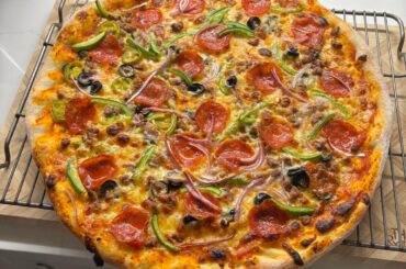 Last nights pie. NY style. Supreme inspired but forgot to get mushrooms.