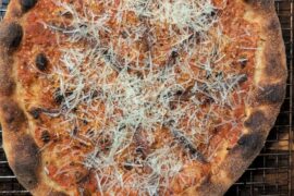 Anchovies + lots of parm and sauce