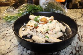 Rigatoni sauce forestière topped with garlic confit