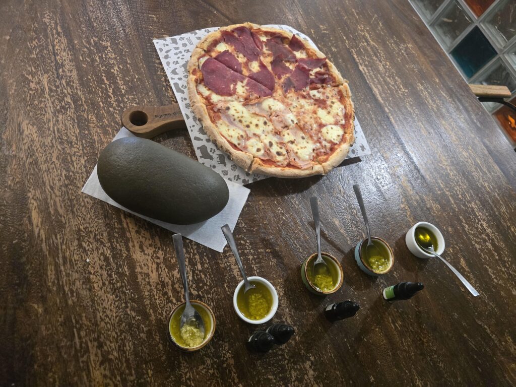 Pizza with stone milled garlic in olive oil
