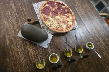 Pizza with stone milled garlic in olive oil