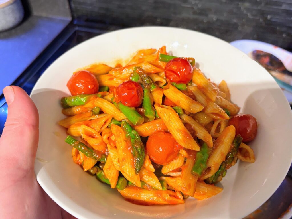 Penne with cherry tomatoes and asparagus