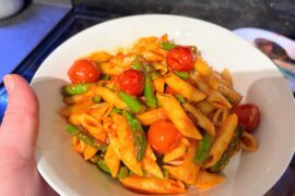 Penne with cherry tomatoes and asparagus