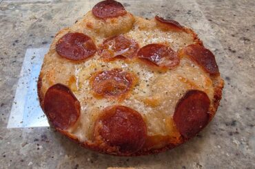 Halved the dough on my personal pan pizzas, and provided some inside pics