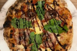 Pancetta pizza with rucula