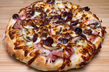 10 inch thick crust: 72 hour cold ferment, no sauce, double cheese, olives, mushrooms and ham