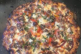 Bacon, sausage, and pepperoni with red onions, bell peppers, and mushrooms, Fresh sliced mozzarella @ 500 degrees for 19min. Finished with fresh chopped basil and cilantro and a sprinkle of everything seasoning. How’d I do?