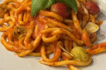 Pici w/ green garlic pomodoro and confit tomatoes