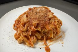 Homemade fettuccine with tomato sauce