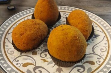 I mitici arancini con ragu' e piselli a Catania