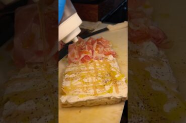 This WHIPPED RICOTTA PROSCIUTTO FOCACCIA from Porchetta Shop in Charleston, SC is 🔥! #DEVOURPOWER