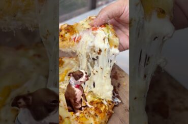 The Perfect Pizza Cheese Pull Trick by ​⁠@zackdfilms