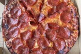 J’s Flying Pizza in MA. Cooked right out of the owner’s home. Absolutely phenomenal bar pie.