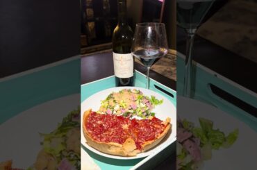 Lou Malnati’s deep dish sausage pizza with a cpk style salad and Italian Wine