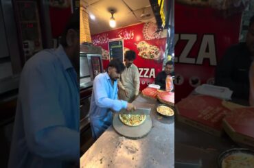 Karachi Spicy Pizza Barkat MarketSmall Pizza = 199rsMedium Pizza = 370rsLarge Pizza = 599rs