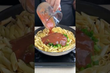 Fried pasta with vegetables and sauce