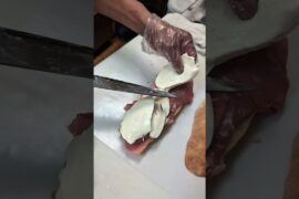 118 Year old Italian deli making sandwiches with fresh mozzarella at Russo's East Village NYC