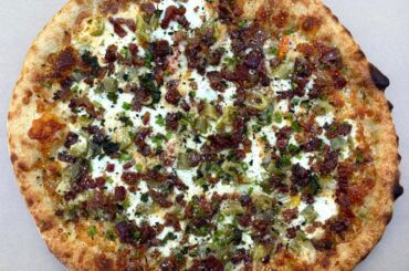 Homemade spicy Giardiniera and bacon pizza