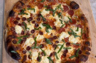 70% hydration , half pepperoni - half jalapeño cheddar duck stick, with ricotta, basil, hot honey