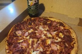 Australian takeaway meatlover's pizza with a Jolt root beer