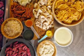 ​Pasta with shredded sirloin, garlic, onion, tomato paste, sun-dried tomatoes, white wine, cream, crème fraîche, veal stock, Dijon mustard, chili flakes, mushrooms, parsley, truffle oil, and parmesan