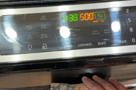 A cheese pizza and a sopressata pizza fresh out of the home oven