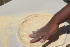 Stretching a 625g dough ball to 20 inches