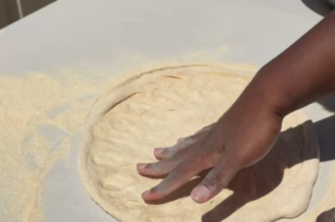 Stretching a 625g dough ball to 20 inches