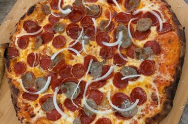 Pepperoni and sausage with white onion