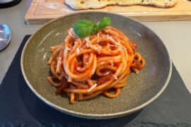 Amatricana and garlic pizza bread