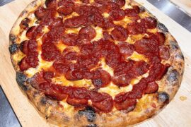 Pepperoni, bacon, onions and banana peppers.