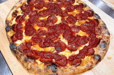 Pepperoni, bacon, onions and banana peppers.