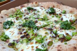 Green asparagus, pistachio, ricotta with wild garlic gremolata pizza