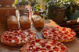 Pepperoni and jalapeño pizza baked on a steel
