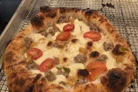 Smoked mozzarella, smoked chiles, tomatoes, fennel sausage, and hot honey
