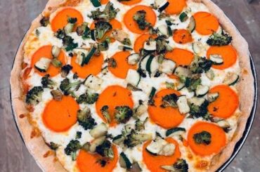 Homemade sweet potato, brocc, zucchini, mozz, red sauce