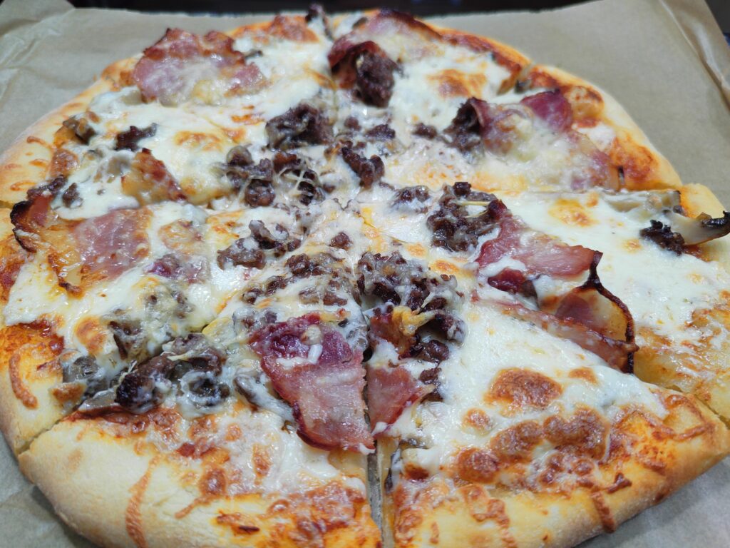 Today I made pizza with ground beef and bacon.